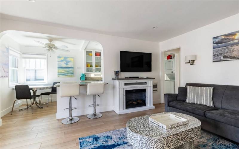 living room with open concept into kitchen