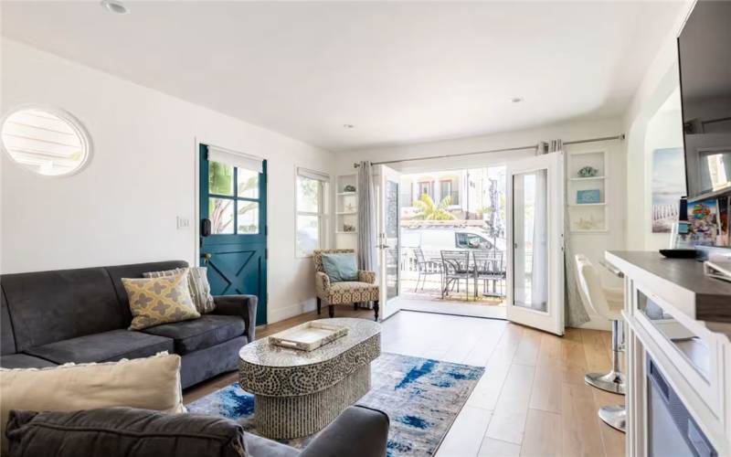 living room looking out onto patio area with French​​‌​​​​‌​​‌‌​​‌​​​‌‌​​​‌​​‌‌​​‌‌​​‌‌​​​​ doors