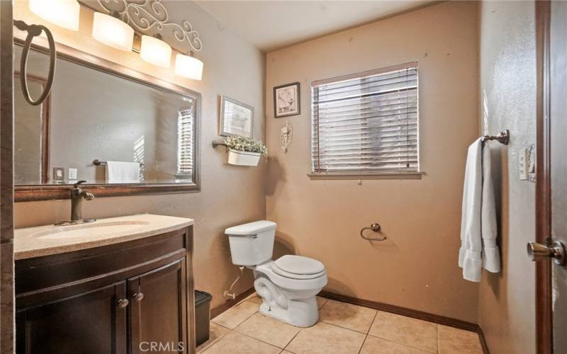 Bathroom with shower in primary bedroom