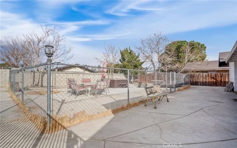 Spacious paved backyard