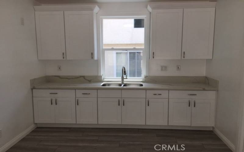 wet bar next to kitchen