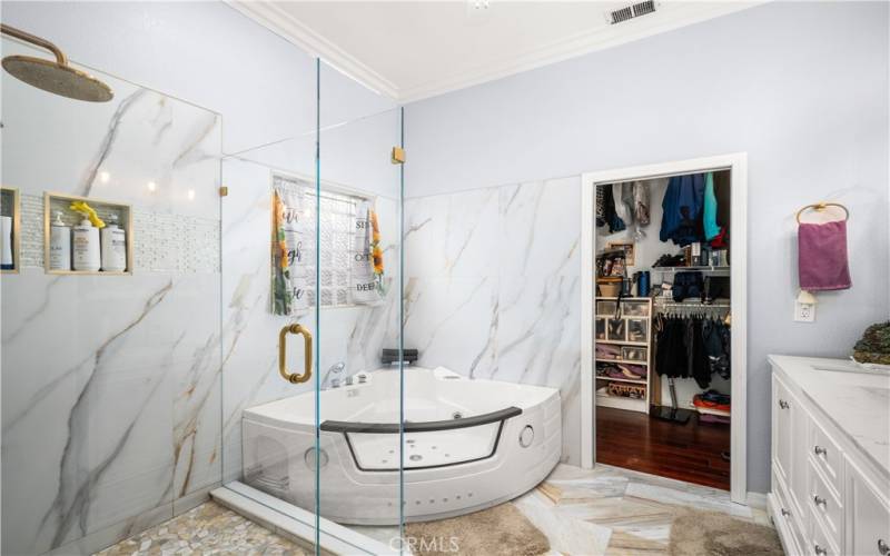 Remodeled Primary Bathroom with Jetted Tub and Separate Walk-in Shower