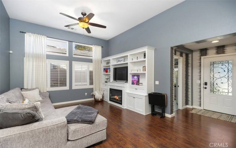 Living Room- custom entertainment center with fireplace