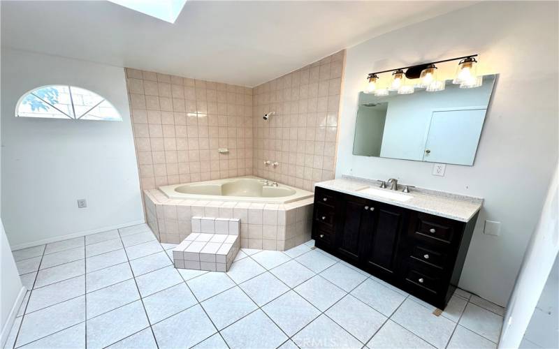 Master Bathroom with step down Soaking Tub