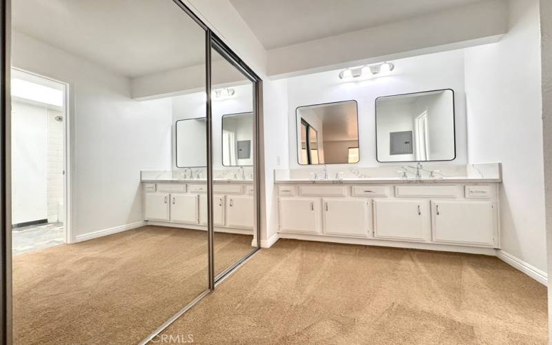 Primary vanity with walk-in to the left