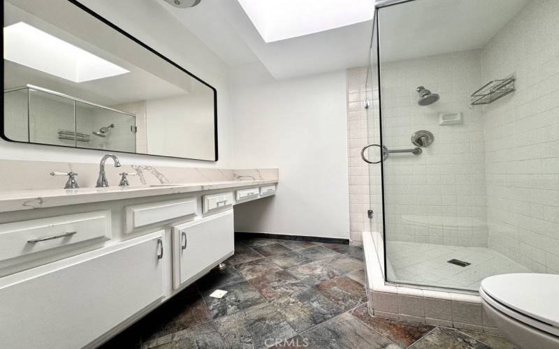 Tons of natural light in the large guest bathroom.