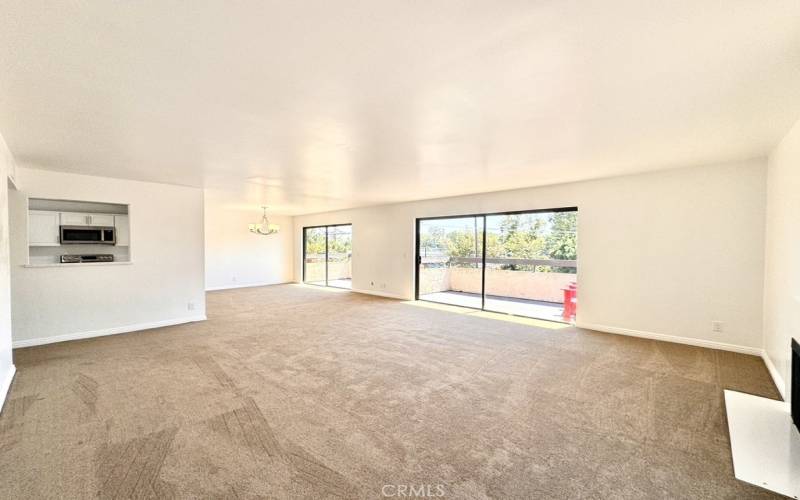 HUGE Great room/formal dining area with 3 massive balconies to catch afternoon breezes.