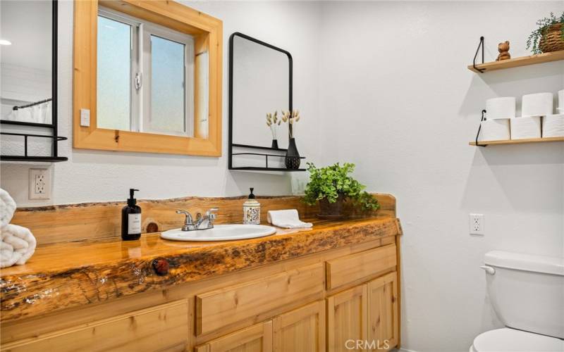 Spacious bathroom creates a classic mountain feel....