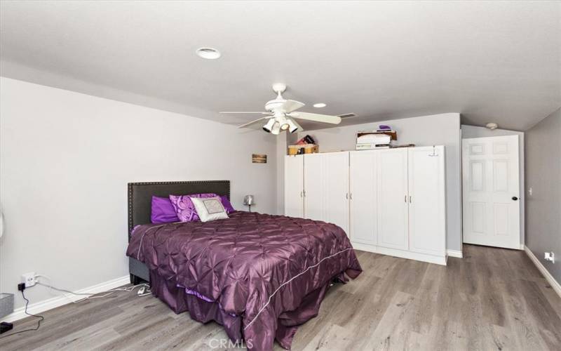 Bedroom 4 upstairs with built-in cabinetry