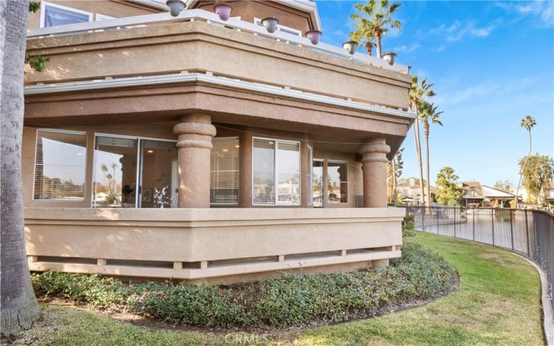 Spacious patio wraps around from Living Room to Kitchen and lake views