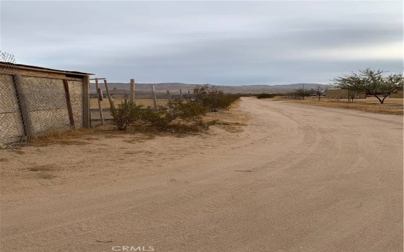 Private Road between For Sale Land and Next Door Neighbor
