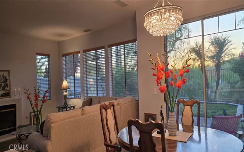 Luxury, bright, dining area with panoramic views of horizon and sunsets