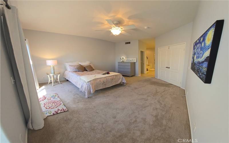 Master bedroom with large, ensuite bathroom