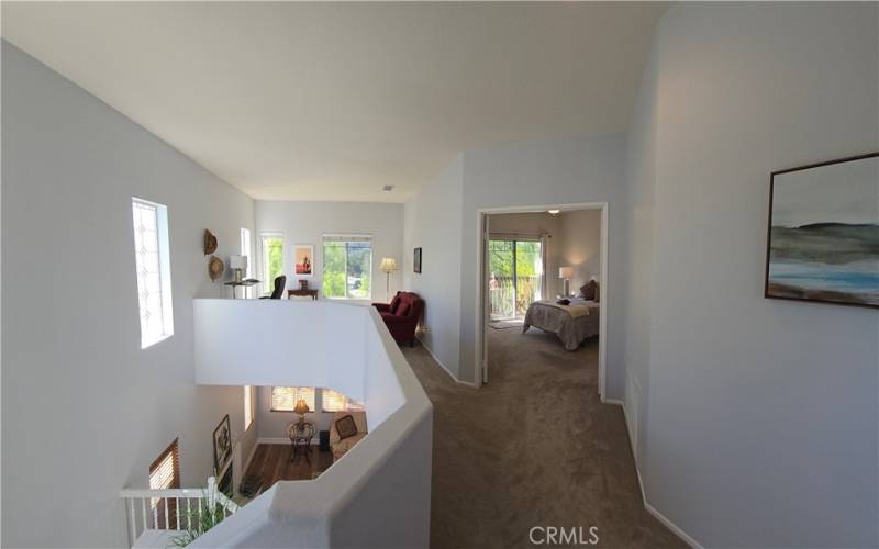 Upstairs landing view of loft and master bedroom