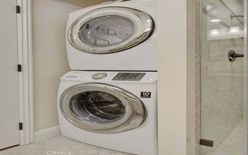 Full size Samsung Washer and dryr is located in the guest bathroom.