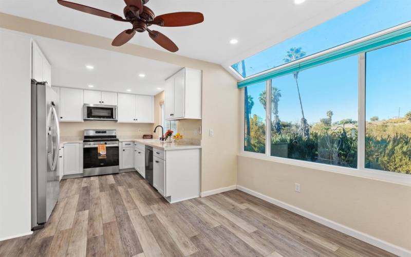 Remodeled kitchen, boasting newer stainless-steel appliances and updated cabinets.