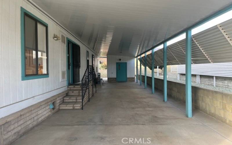 Aluminum Covered Carport and Rear Entrance with Storage Shed