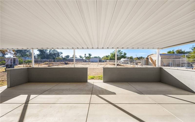 huge metal covered patio that will never rot.. new concrete under patio