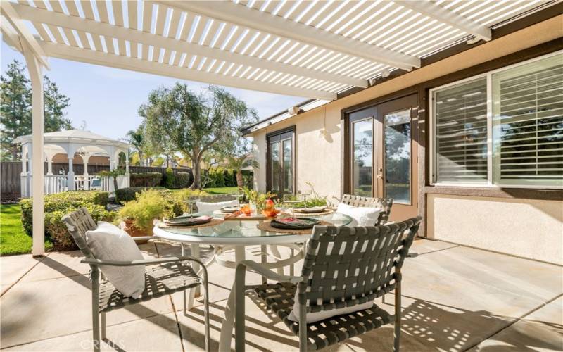 Covered patio with view to gazebo