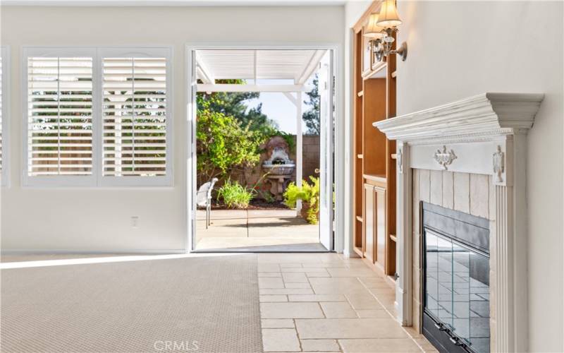 Family room with french doors leading to a covered patio