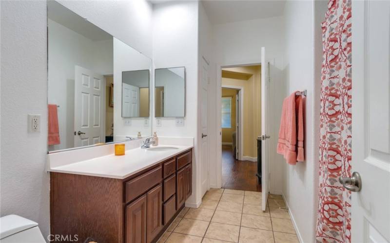 Bathroom with Access to Both Hallways