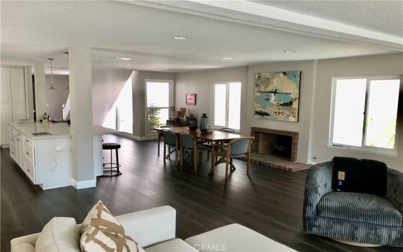 Dining area, fireplace and island all in the great room