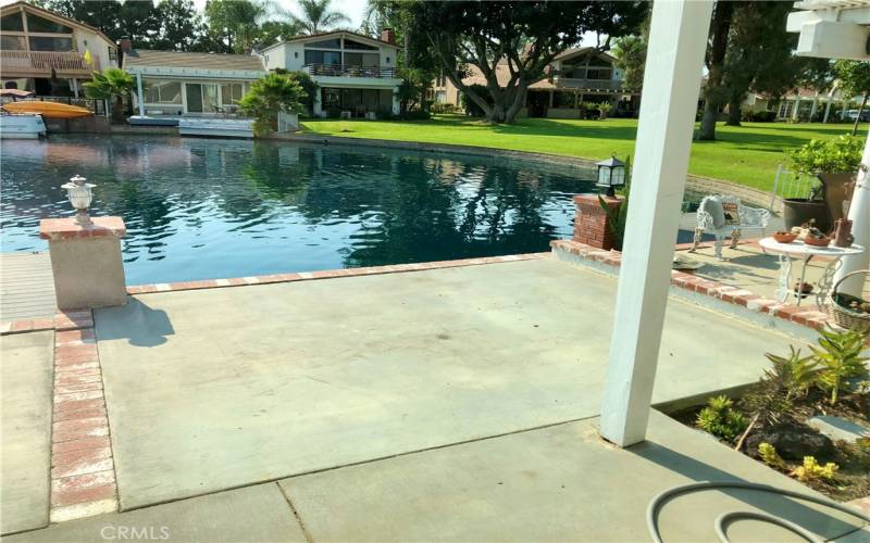 Back partially covered patio perfect for outdoor living and entertaining