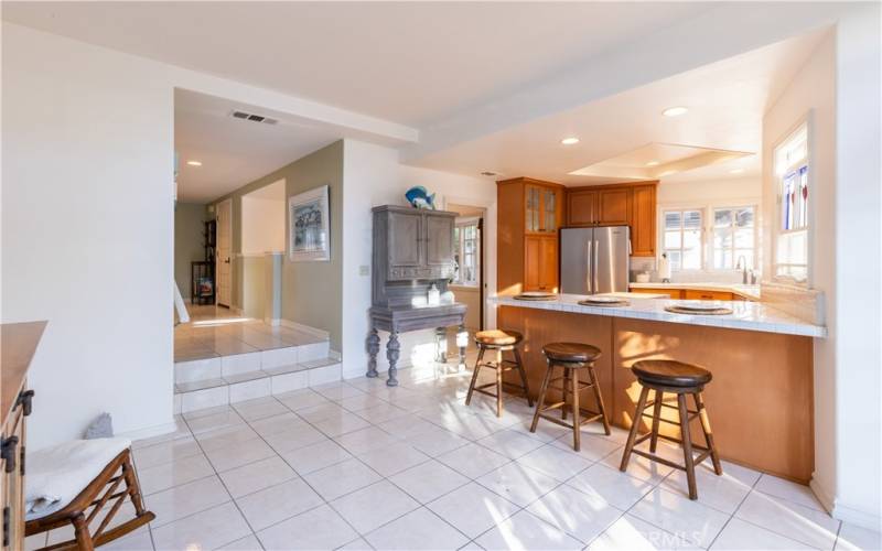 Large kitchen with entry to formal dining and living rooms