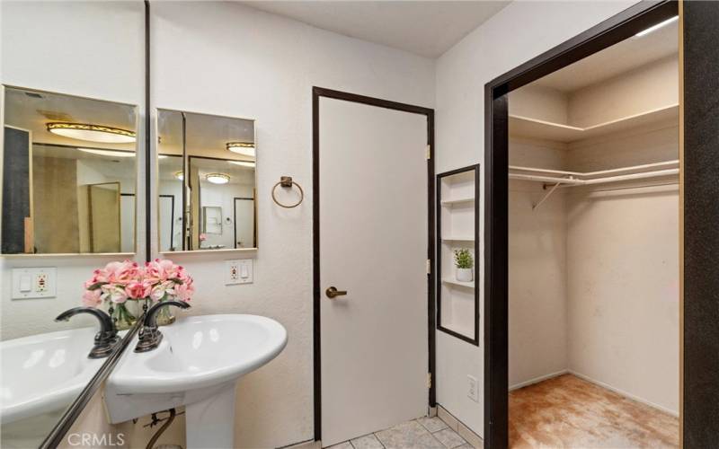 Primary Bathroom with walk-in closet