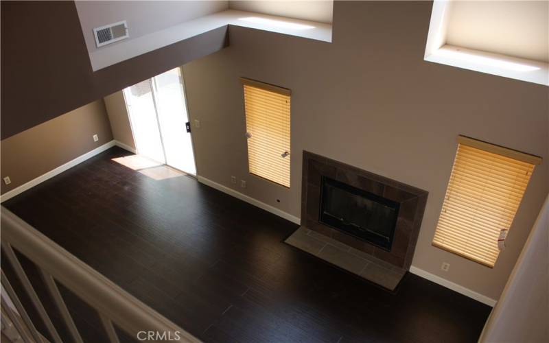 Living room with 2 story high ceiling