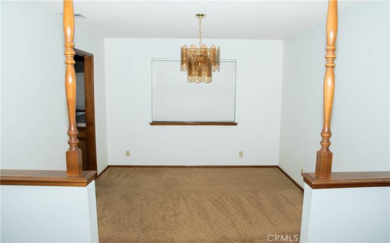 Formal dining room next to the kitchen.