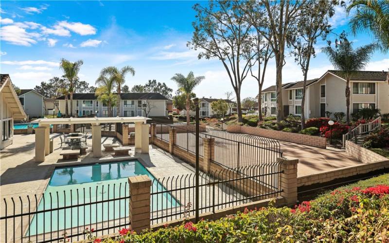 The community pool area features a wading pool, perfect for little ones.