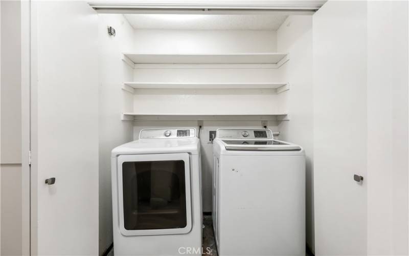 The laundry closet is located upstairs in the hallway closet. The washer and dryer are included!