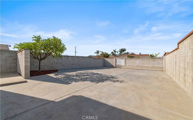 Spacious driveway with gate