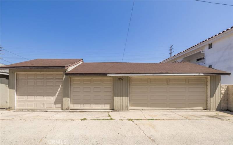 View of garages from the alley.