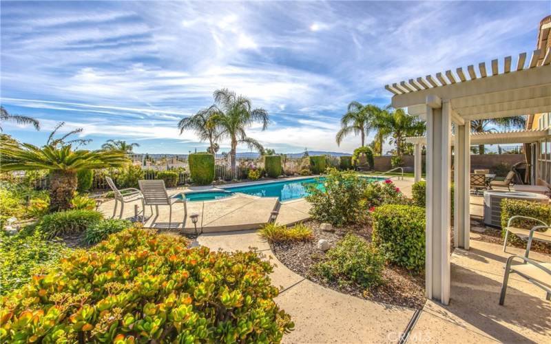 Large yard with pool and views