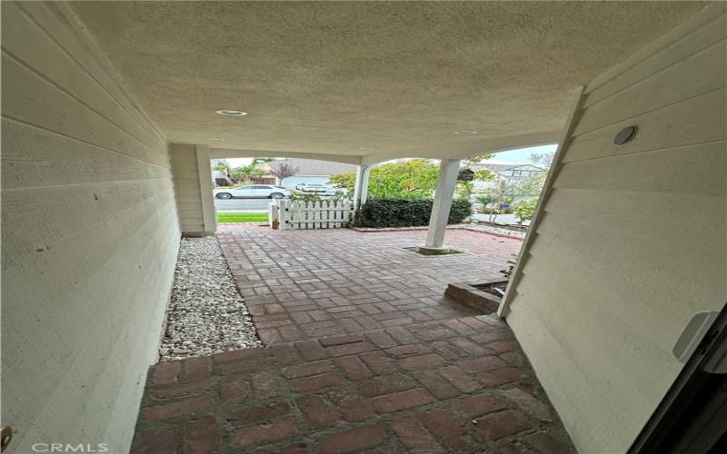 Covered front porch with closing gate.