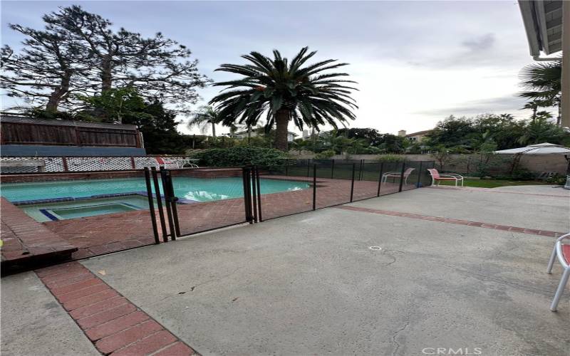 Spacious Backyard is partially paved