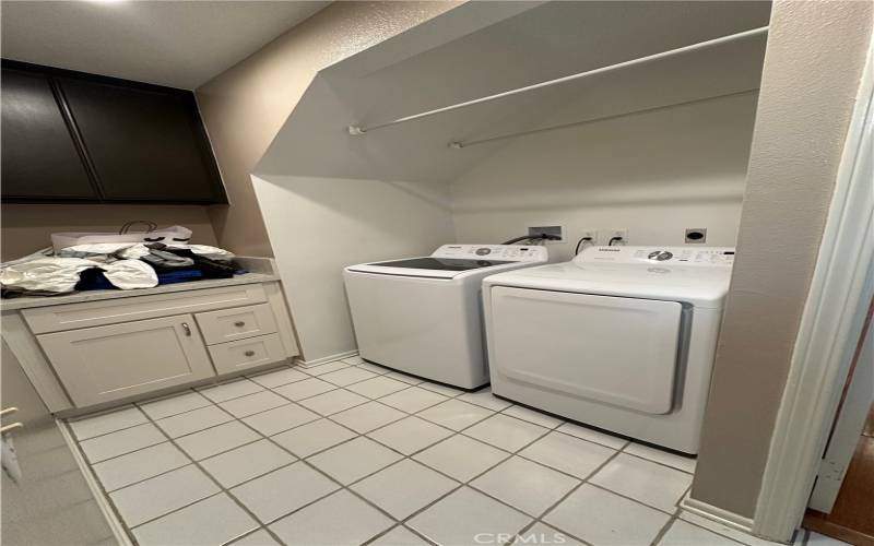 Washer / dryer in indoor laundry area