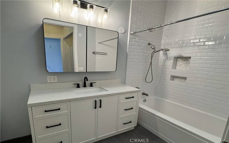 Newly remodeled bathroom with extra storage and large soaking tub