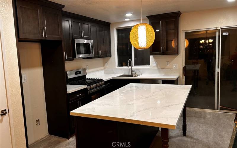 Artistic lamp above the kitchen island