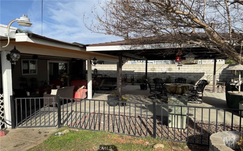 Large covered patio PLUS additional covered sitting area.