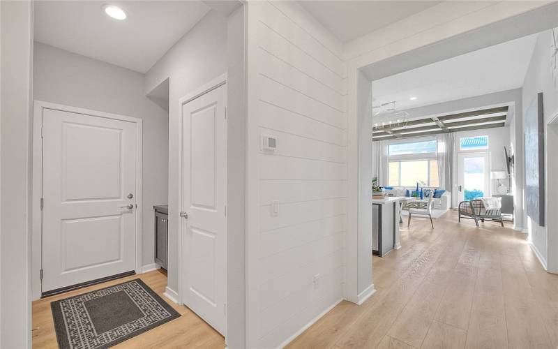 Hallway Leading to Garage and Laundry Area to the left