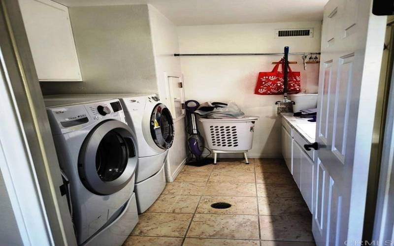 Laundry with Dumb Waiter to Send Up Groceries