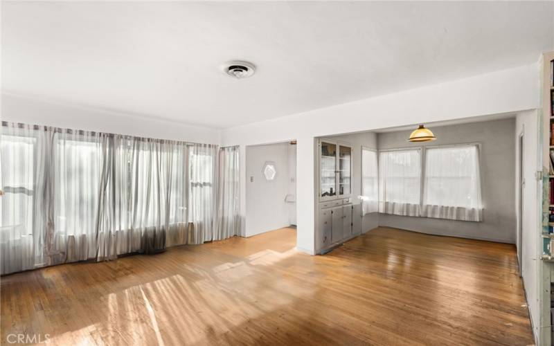 Natural light and original hardwood flooring.