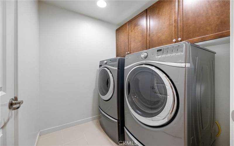 Indoor full-size washer and dryer included