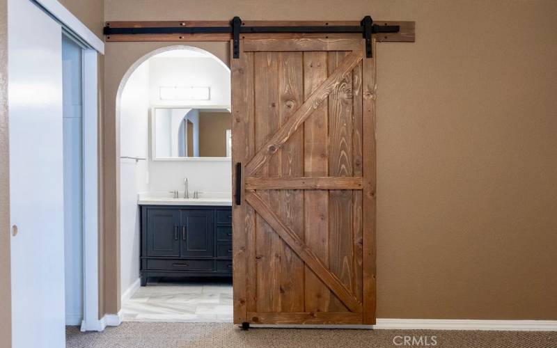 Sliding Barn Door to Primary Bathroom