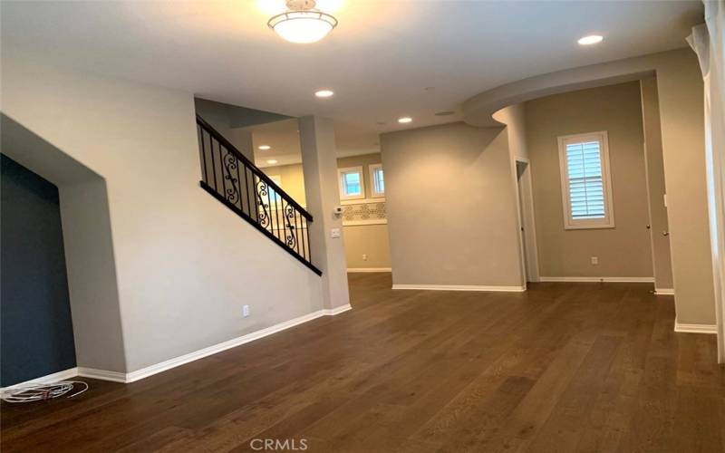 Living Room, Guest Bath on left and coat closet on right