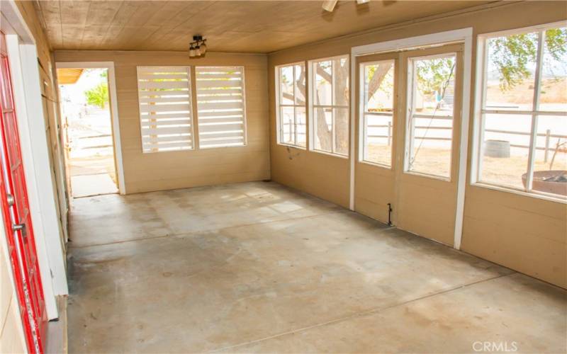 Giant Arizona Room/ enclosed patio on the rear of the home.