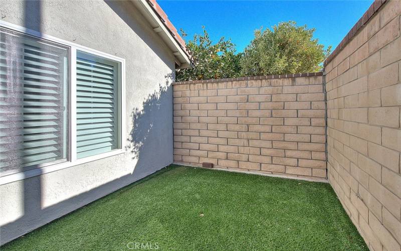 Artificial turf in portion of backyard